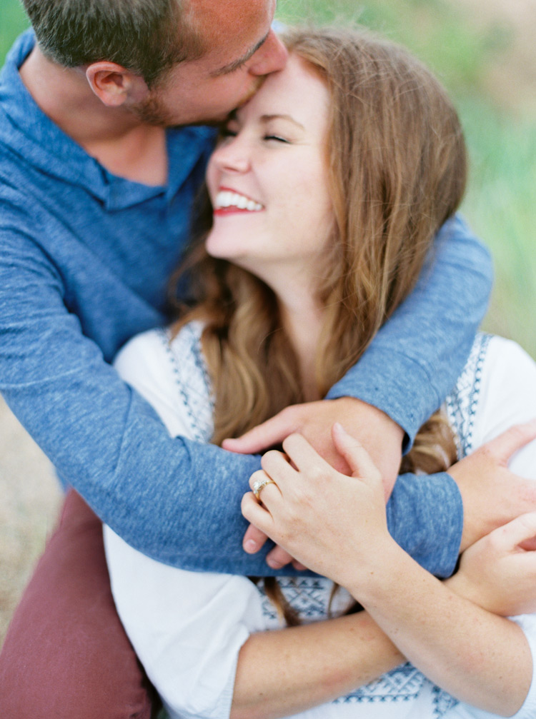 Sweet embrace of an engaged couple in love shoot
