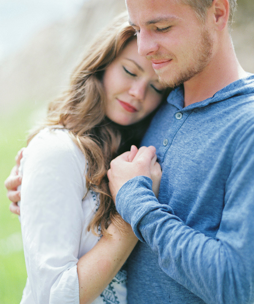 Groom holding his soon-to-be wife closely shoot in Colorado