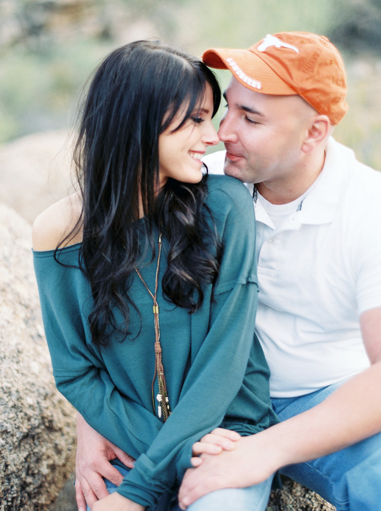 Nose-to-nose with the love of her life! Casual engagement shoot style. Texas Longhorns fan.