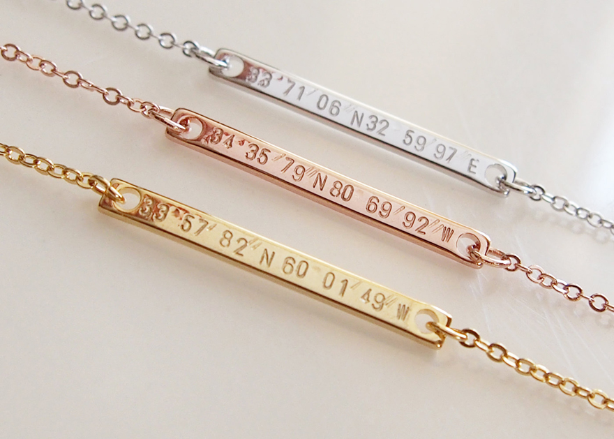Personalized coordinate silver, rose gold and gold necklaces.
