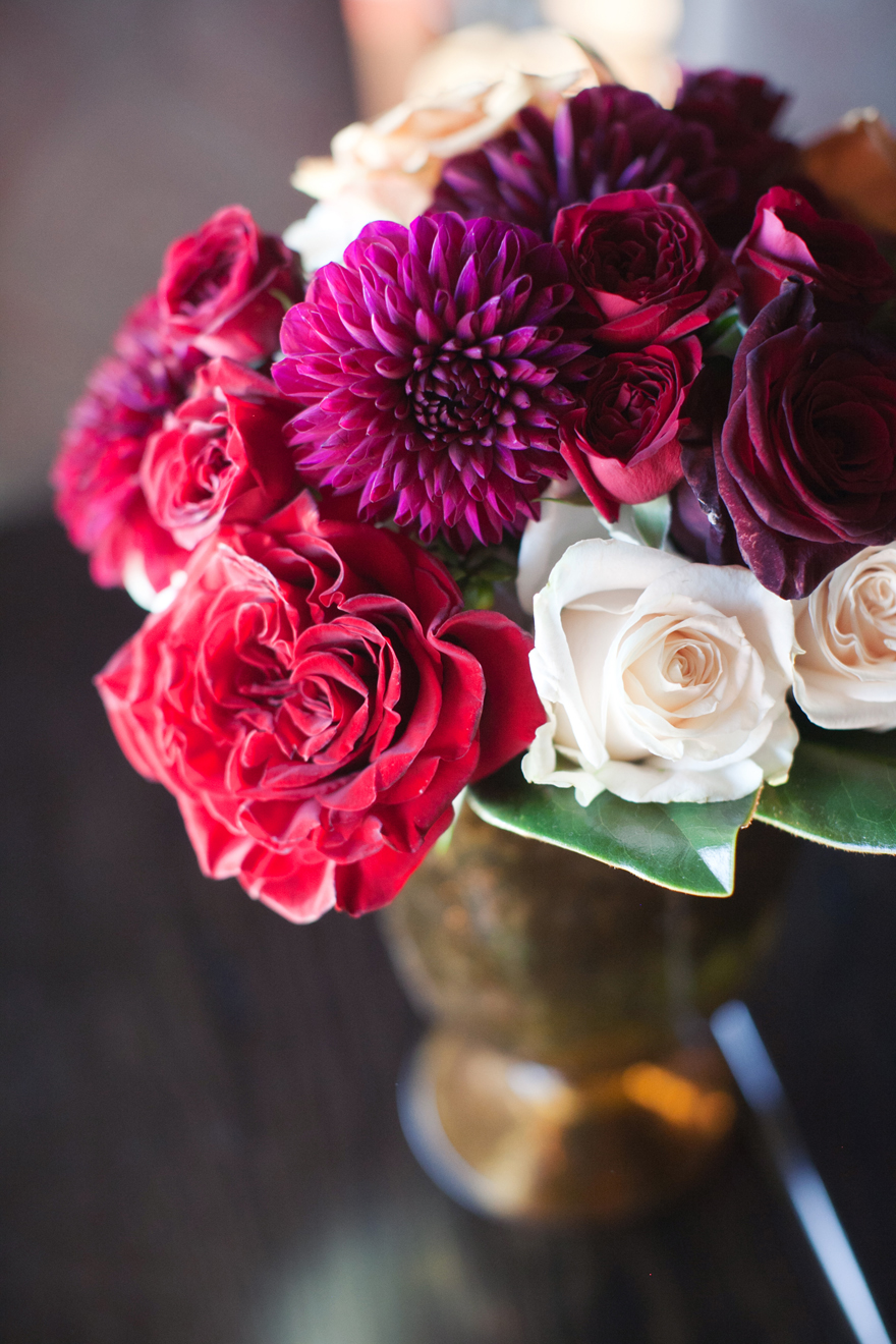 Dark flowers and roses for vibrant wedding scheme