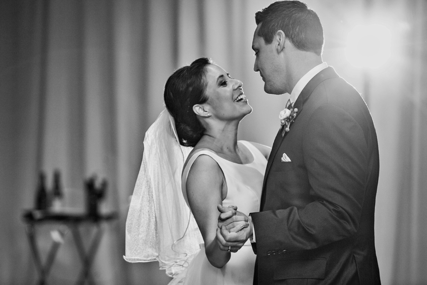 Laughter & love during the bride & groom's first dance at their wedding reception.