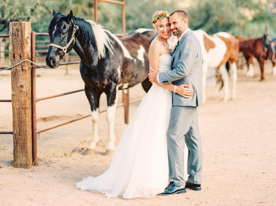 Bride and groom smiling on their wedding day. Beautiful ranch wedding at Saguaro Lake Ranch in Mesa.