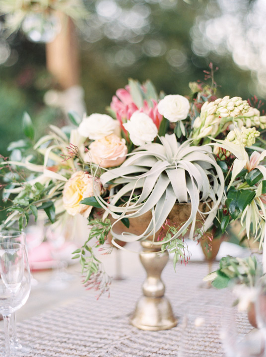 Beautiful floral arrangement for wedding reception table design. Table center piece ideas. 