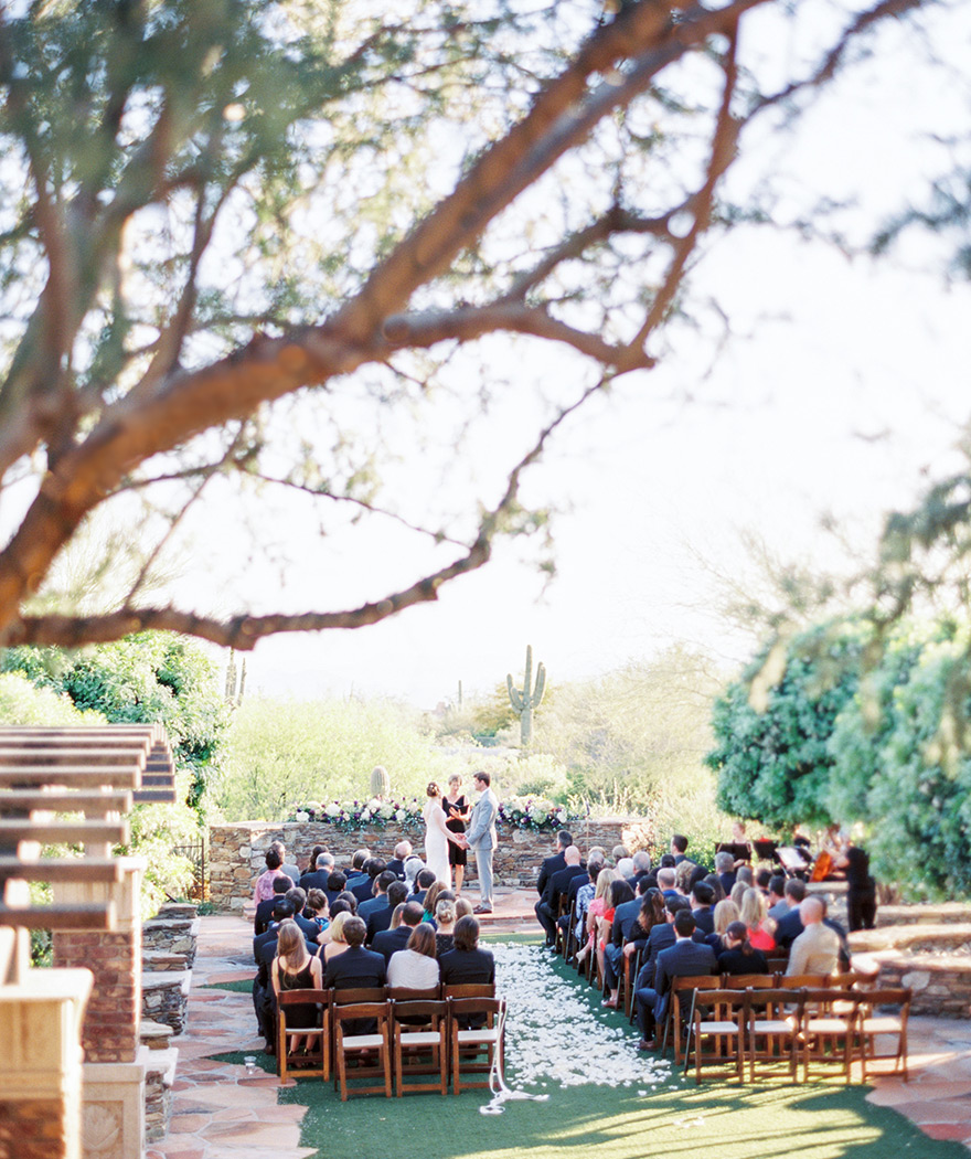 Gorgeous outdoor wedding ceremony in the Arizona desert. Venue is Sassi in Scottsdale, AZ. 