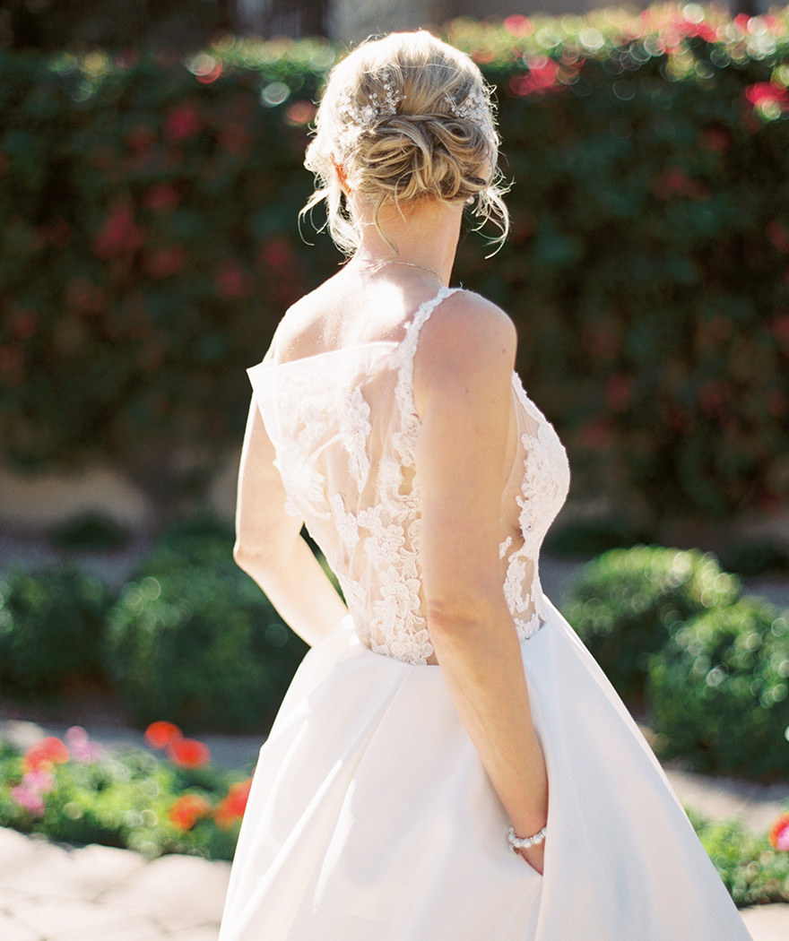 wedding dress of satin, illusion, and lace