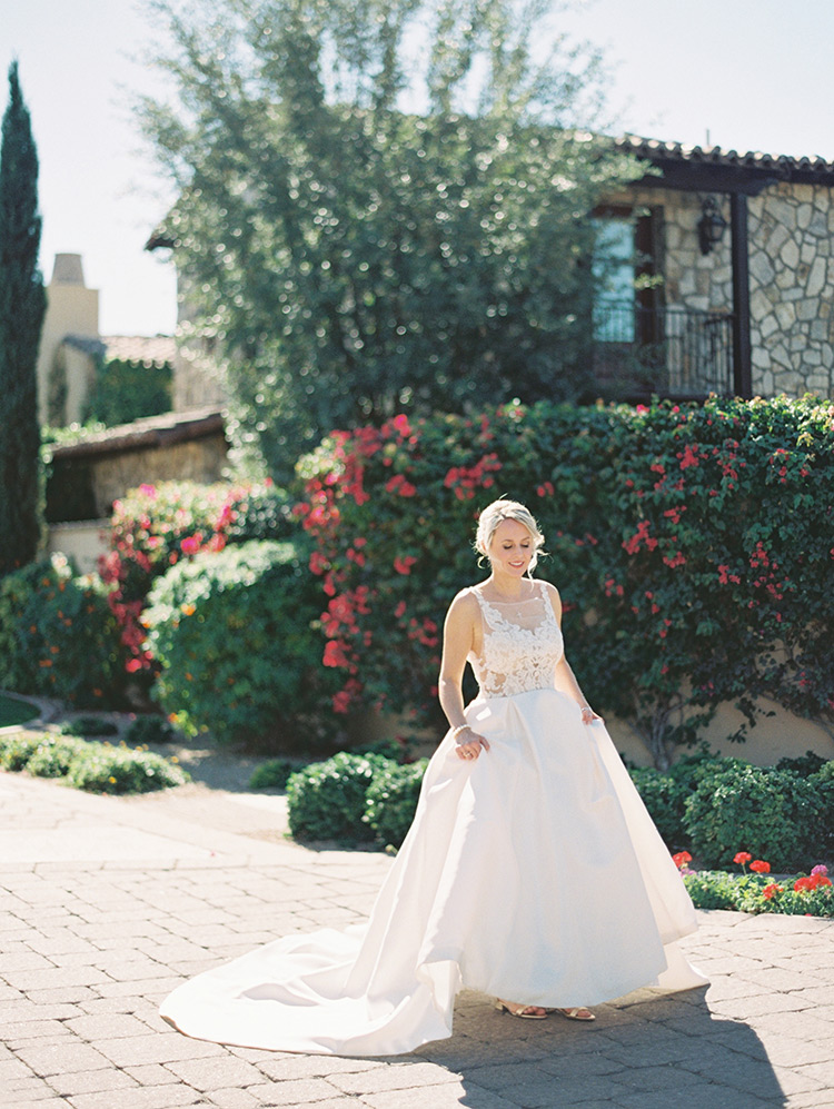 wedding dress of satin, illusion, and lace