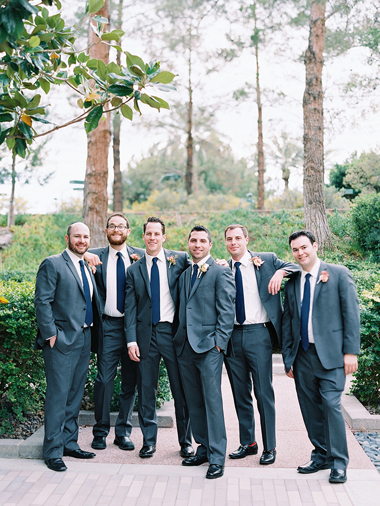 groomsmen in grey suits with blue ties