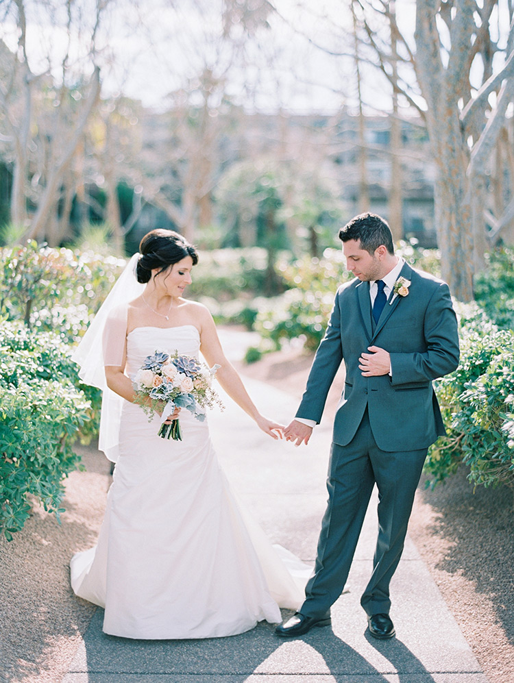 elegant bride & groom, pale peach bouquet with succulents & dusty miller