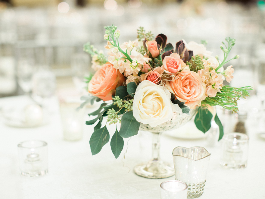 ballroom wedding reception with peach & blush flowers
