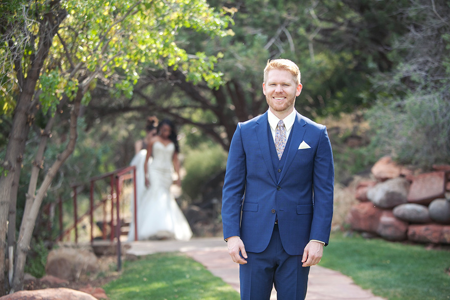 blue suit with paisley tie