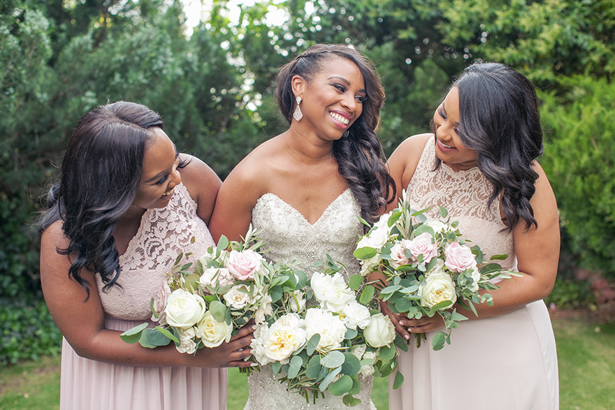 Bridesmaids in blush and cream lace 