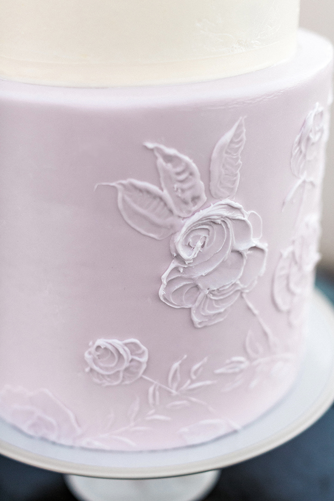 Delicate lavender & white cake with flowers