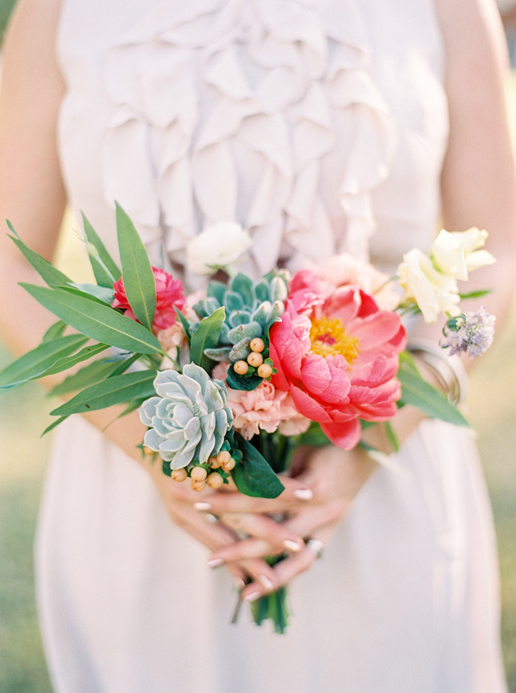 loose bouquet of succulents and pink flowers