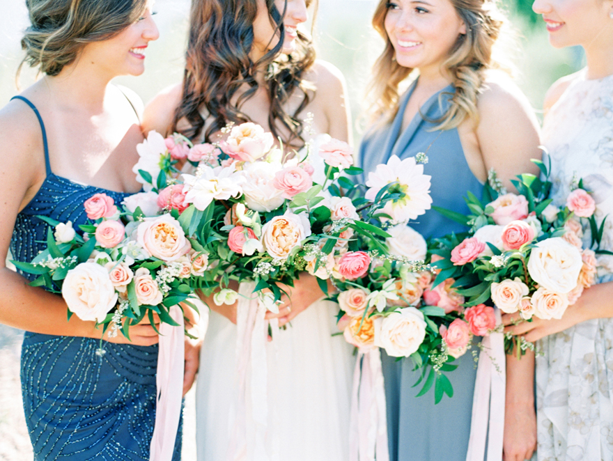 mismatched bridesmaids in blues and neutrals