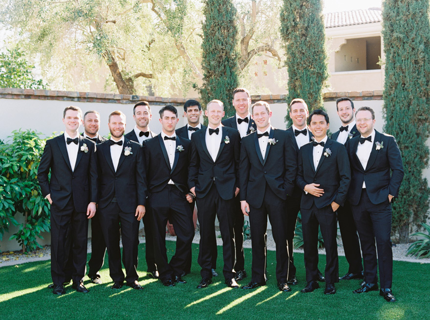 groomsmen in classic black tuxes