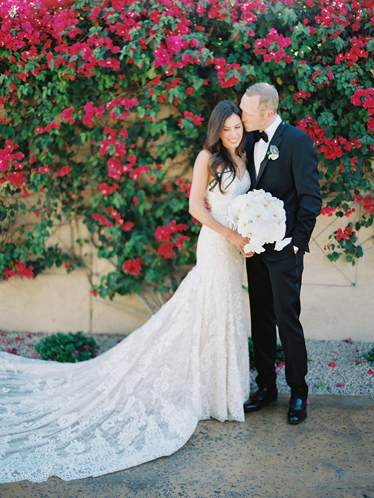 classic black tux and white lace wedding gown