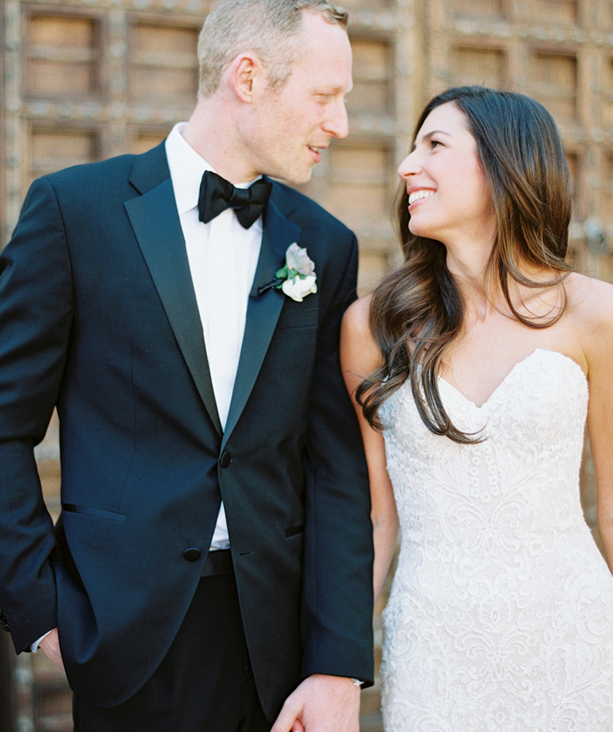 classic black tux and white lace wedding gown