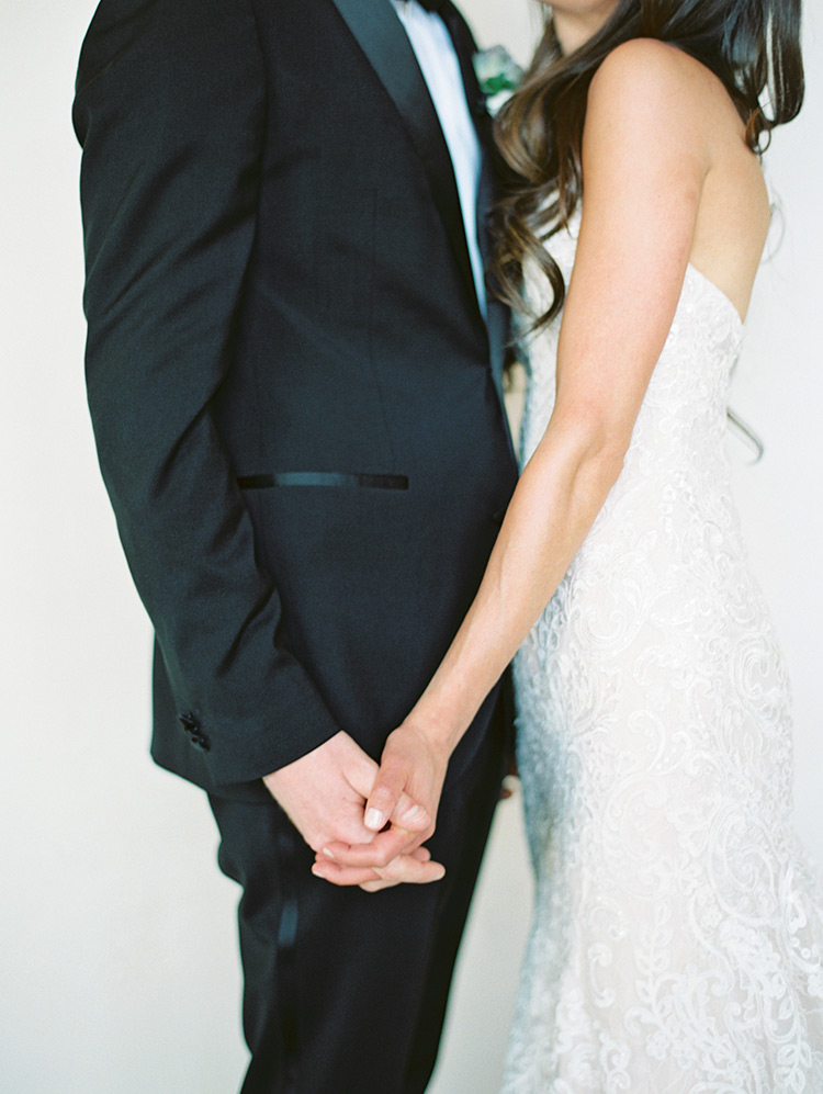 classic black tux and white lace wedding gown