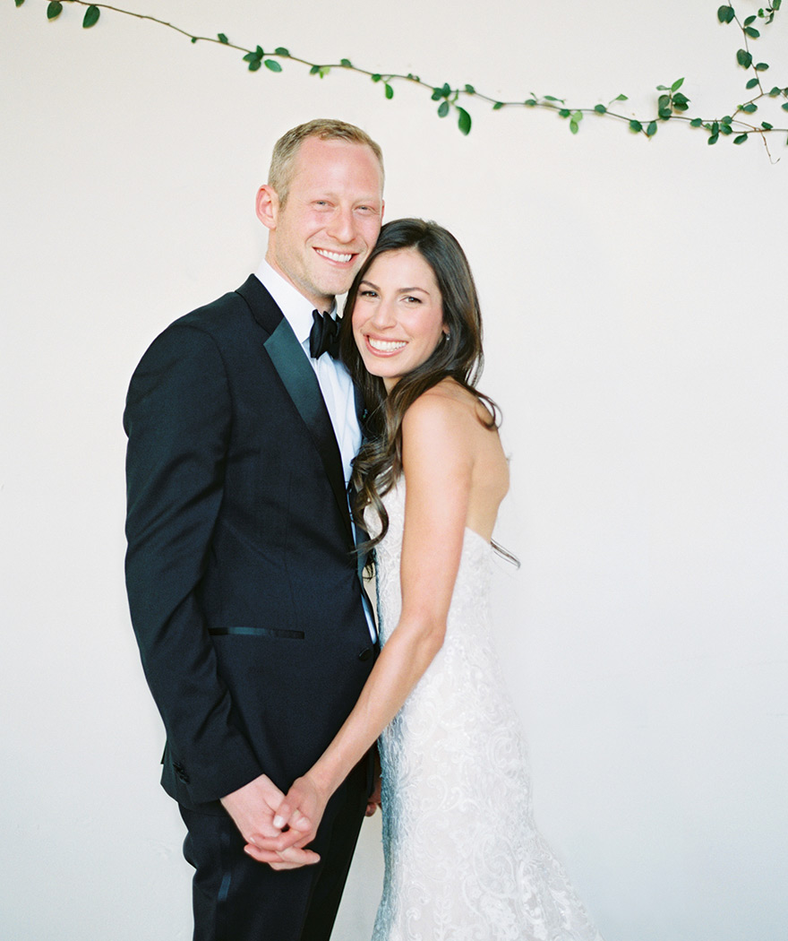 classic black tux and white lace wedding gown