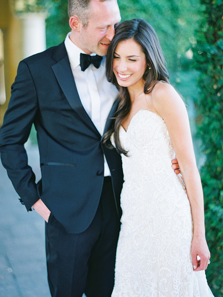 classic black tux and white lace wedding gown