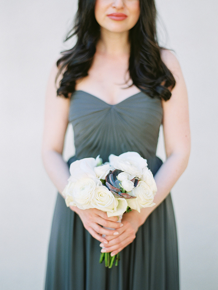 bridesmaid bouquet of white roses & a succulent