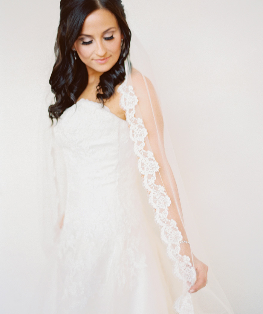 cathedral length veil edged in scalloped lace