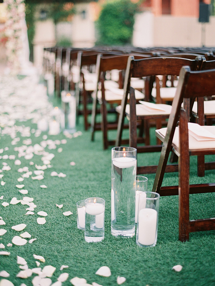 floating candles at an outdoor wedding