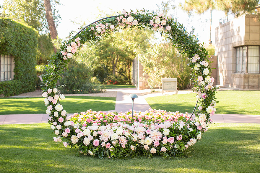 circle flower installation for an outdoor ceremony