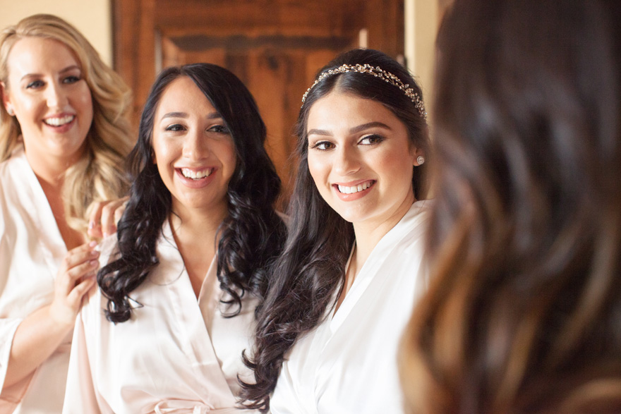 bridesmaids laughing together