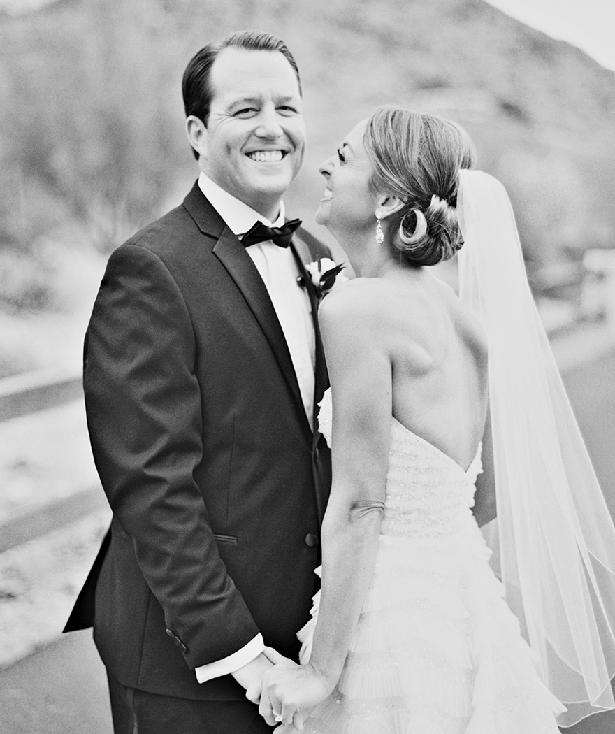 Black and white portrait of a smiling bride & groom!