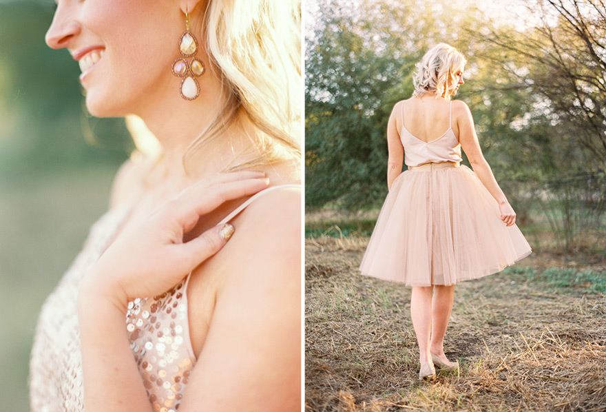 Graceful portrait of blonde smiling with dazzled earrings and tulle dress. Outdoor nature session. 