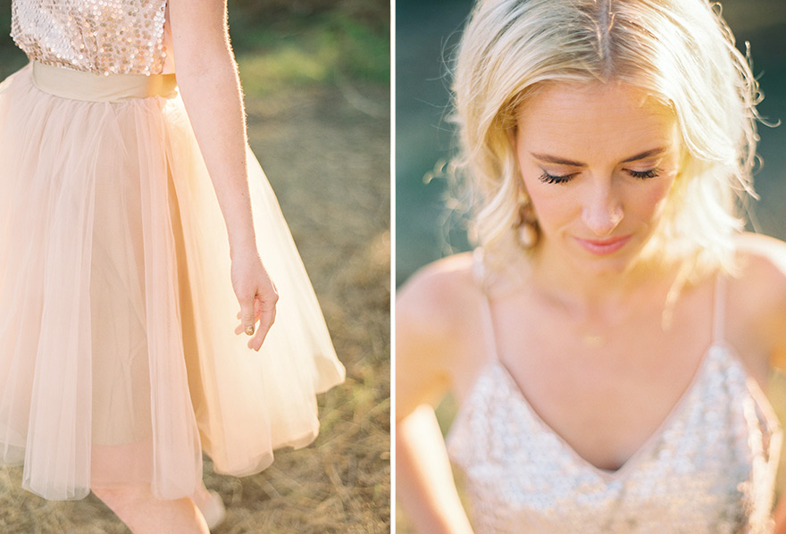 Girl glances down in outdoor session. Blush and light filled scenery. 