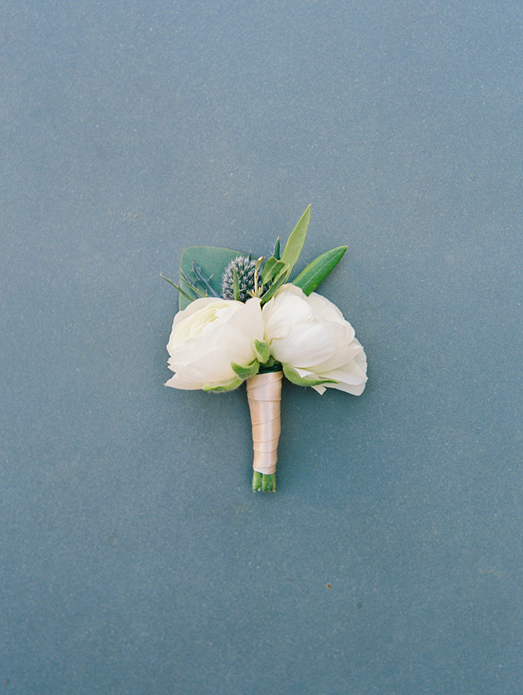 boutonniere with roses & thistle