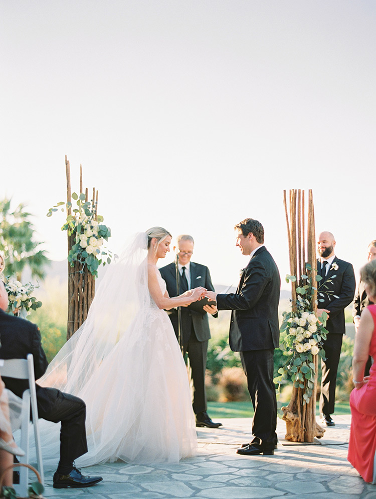 outdoor wedding ceremony with Saguaro cactus skeletons