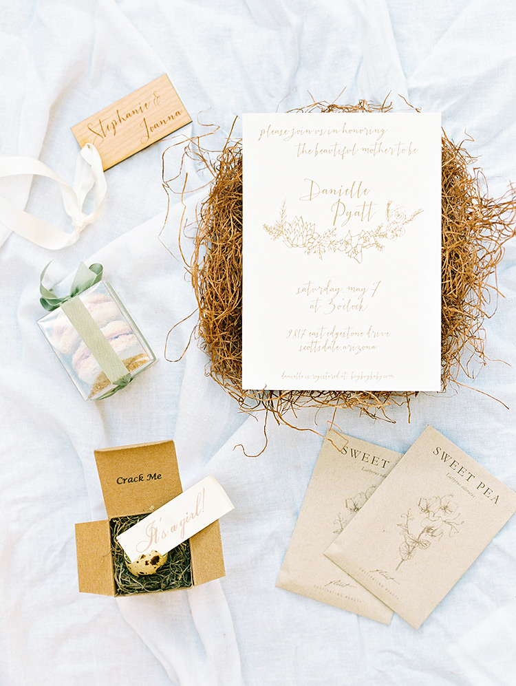 Creative baby shower invitation and gender reveal in an egg