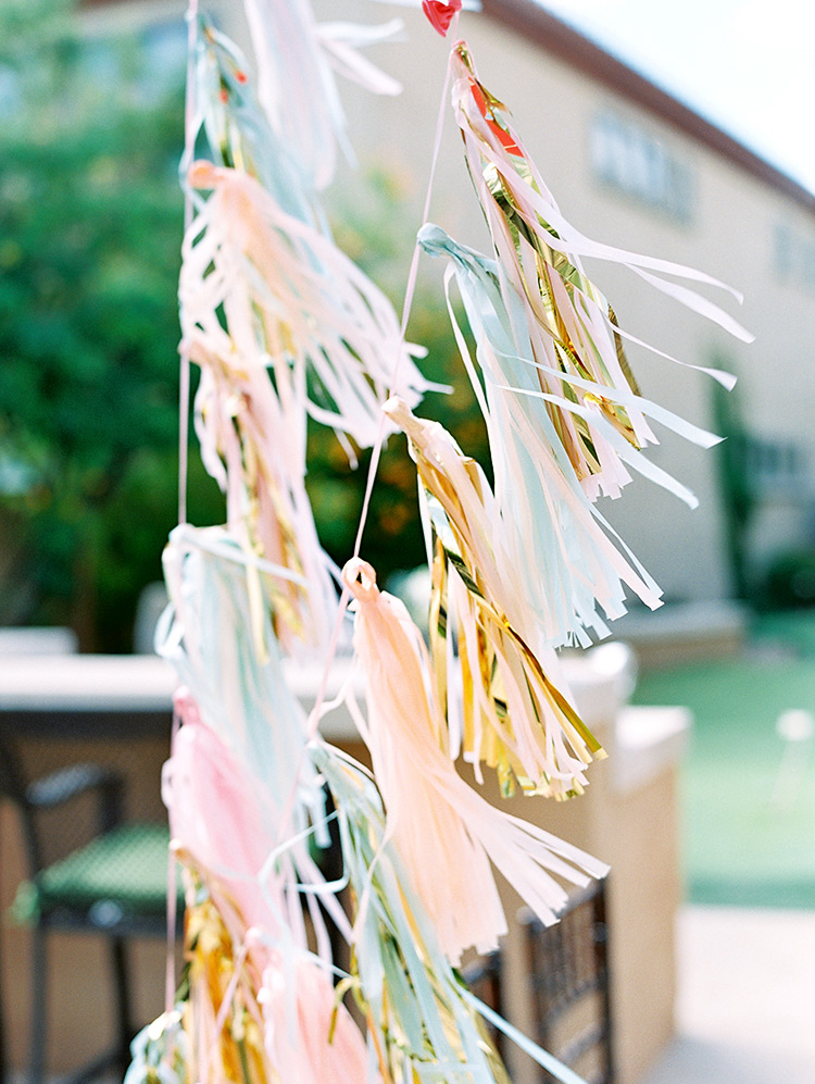 Paper tassels decorate a baby shower