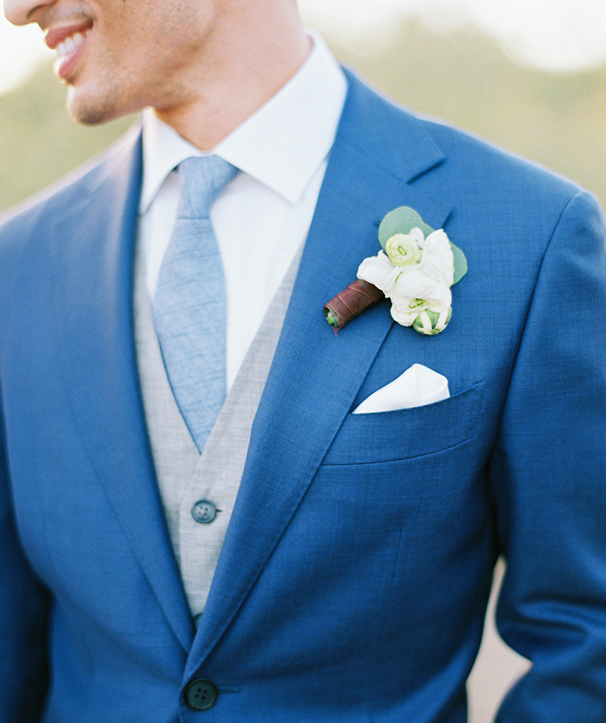 three-piece suit and a stellar boutonniere 