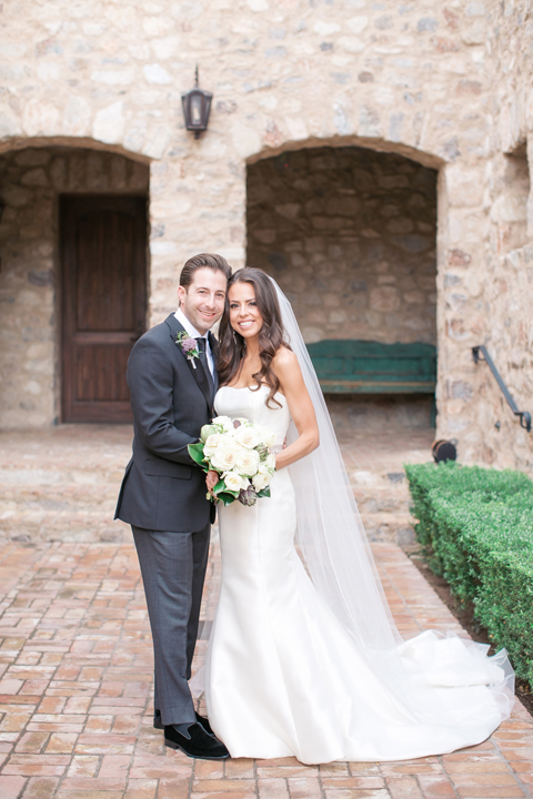 Full length portrait of a happy bride & groom. Silverleaf