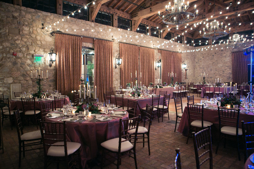 Elegant reception with stone walls and purple decor. Silverleaf