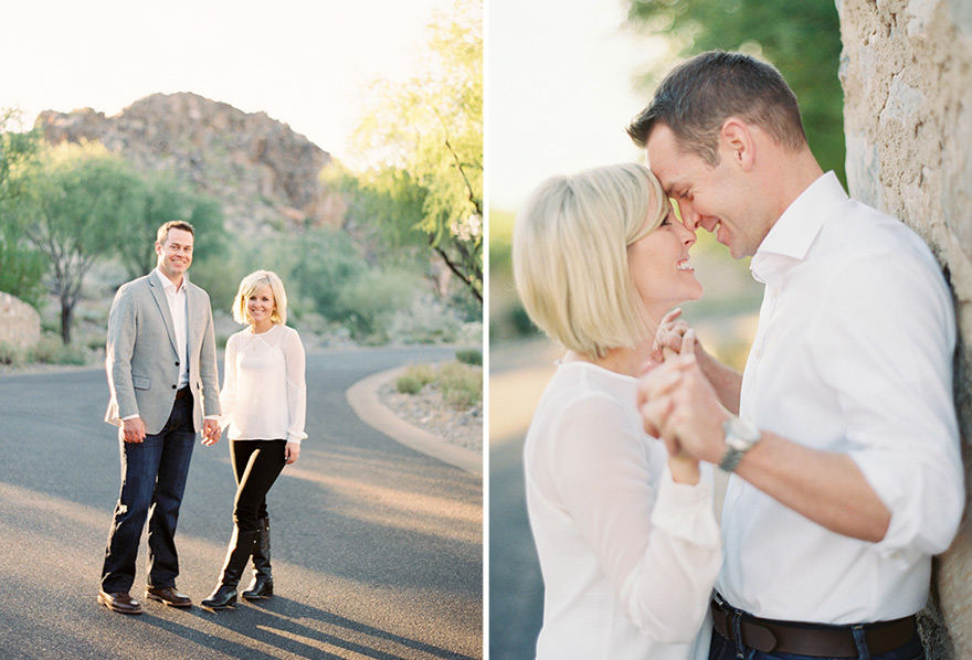 Classy couple stand hand in hand against wall and in open street shoot 