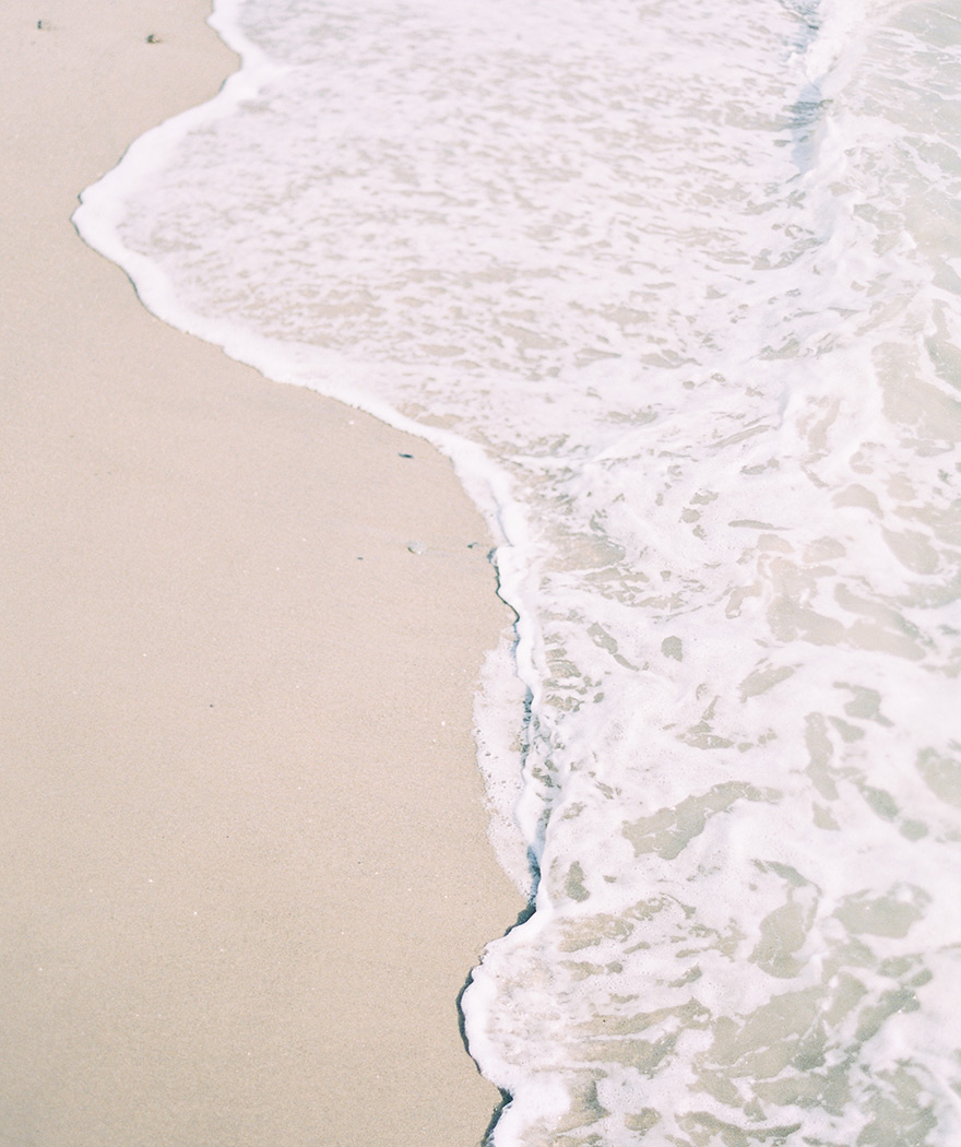 waves breaking on the sand in Victoria Beach