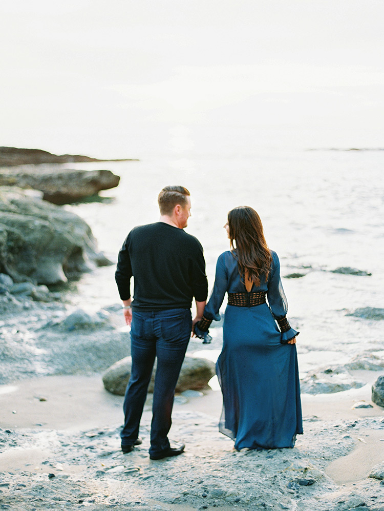 holding hands at Victoria Beach, engagement photos