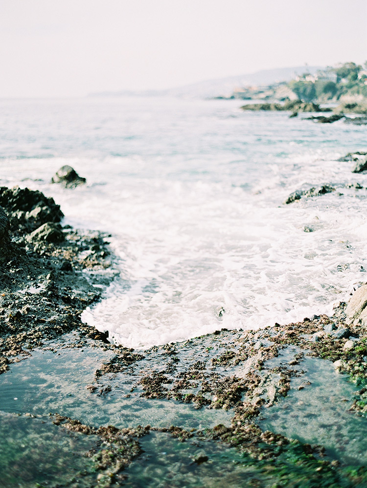 waves break on the rocks at Victoria Beach