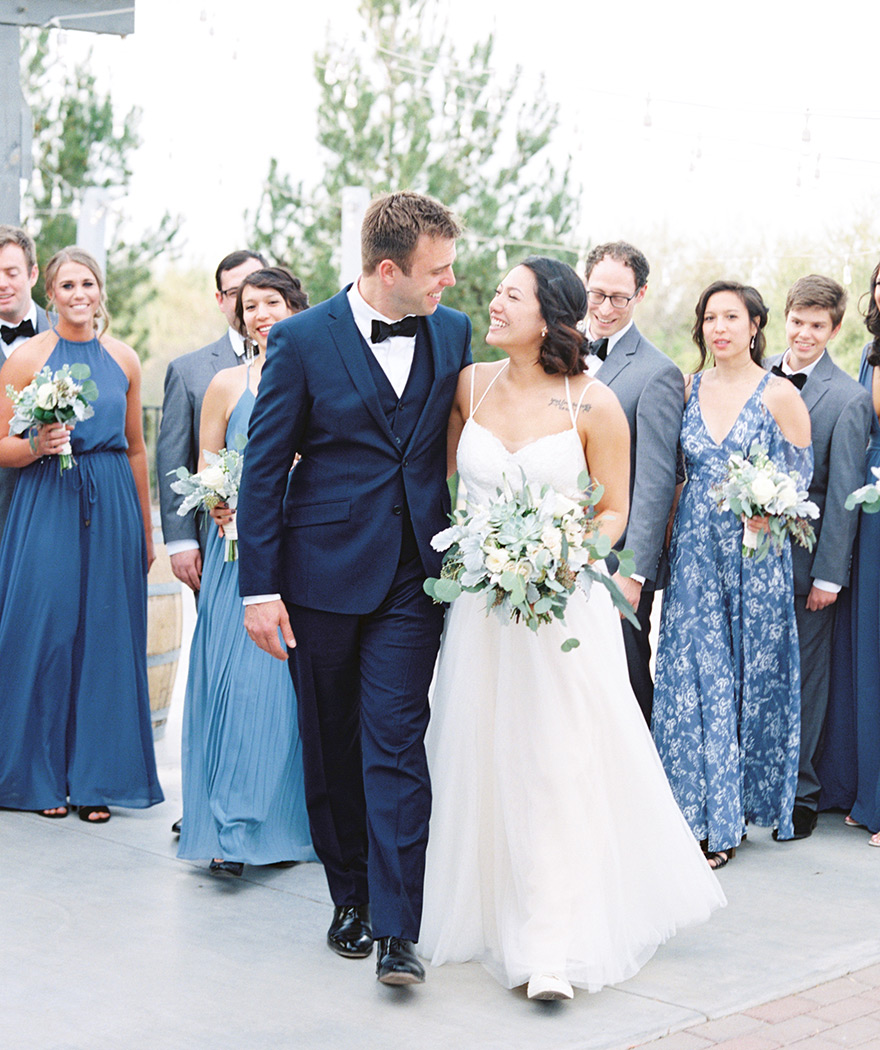 bridal party in blue and grey