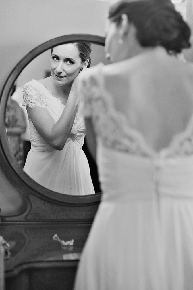 bride's finishing touches at Wrigley Mansion